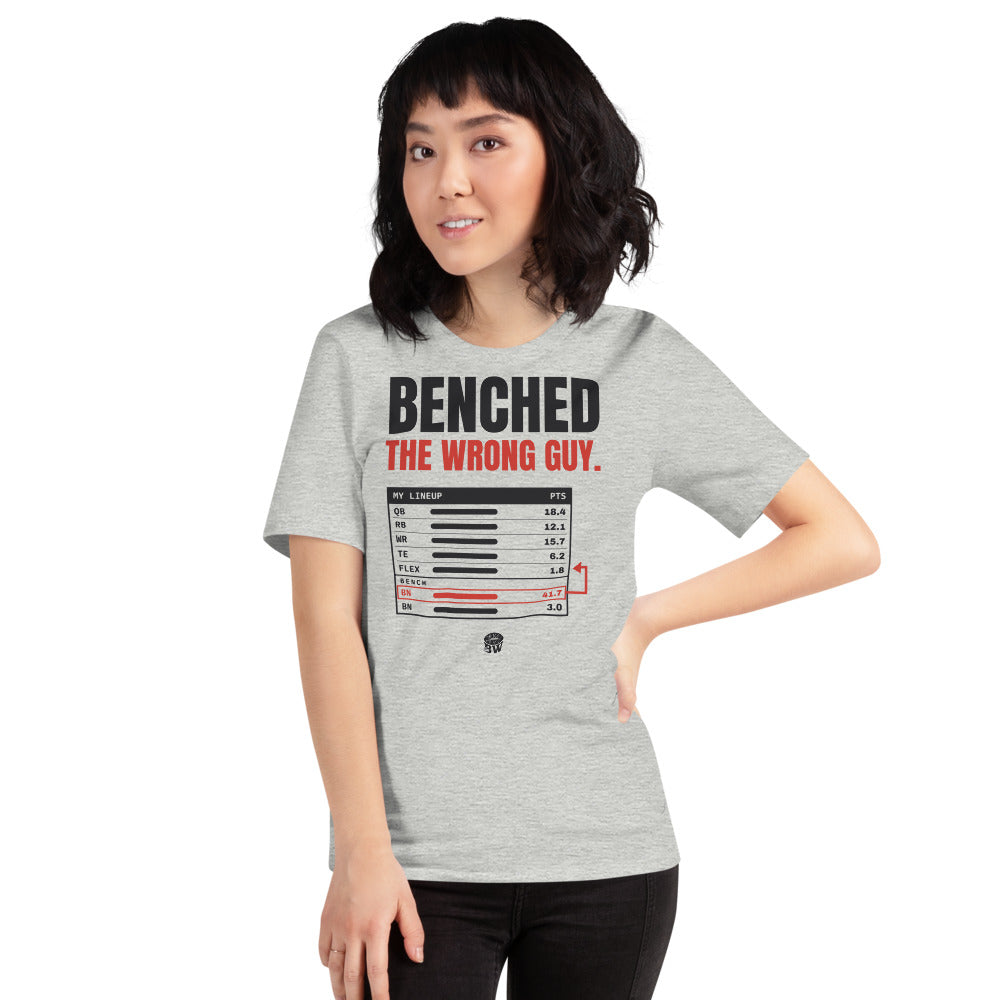 Woman wearing the Benched the Wrong Guy tee in Athletic Heather
